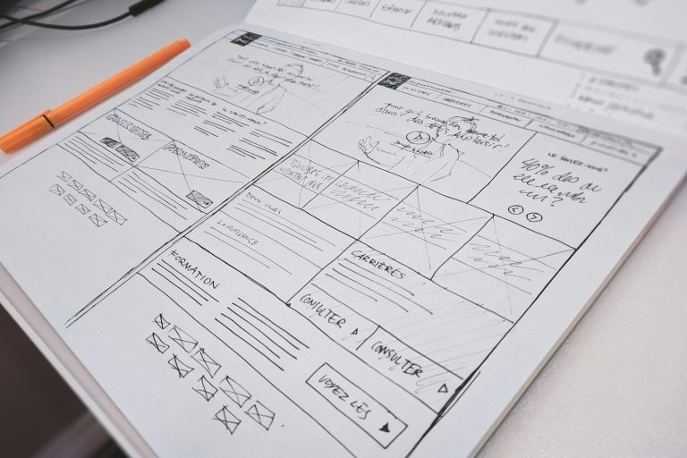 Website wireframe sketch on paper, representing a WordPress rebuild
