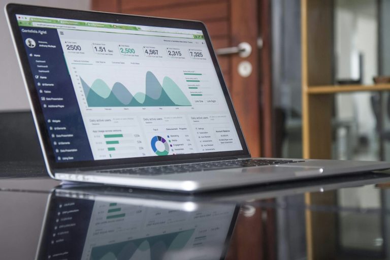 Laptop displaying an analytics dashboard with charts, used to illustrate a technical SEO checklist