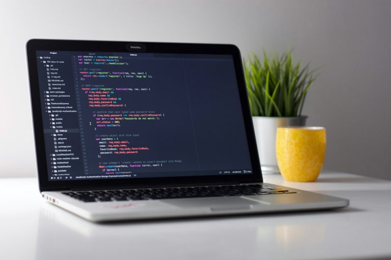 Laptop screen showing code, used to illustrate a WordPress site speed audit